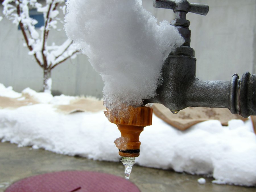 ice on a frozen tap outside