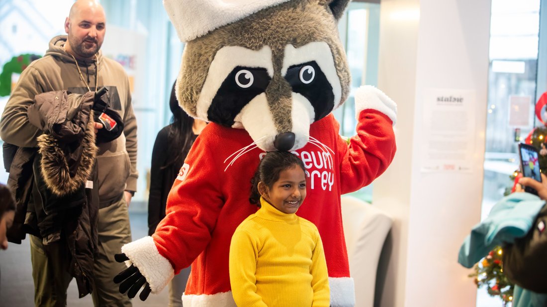 kid and a mascot