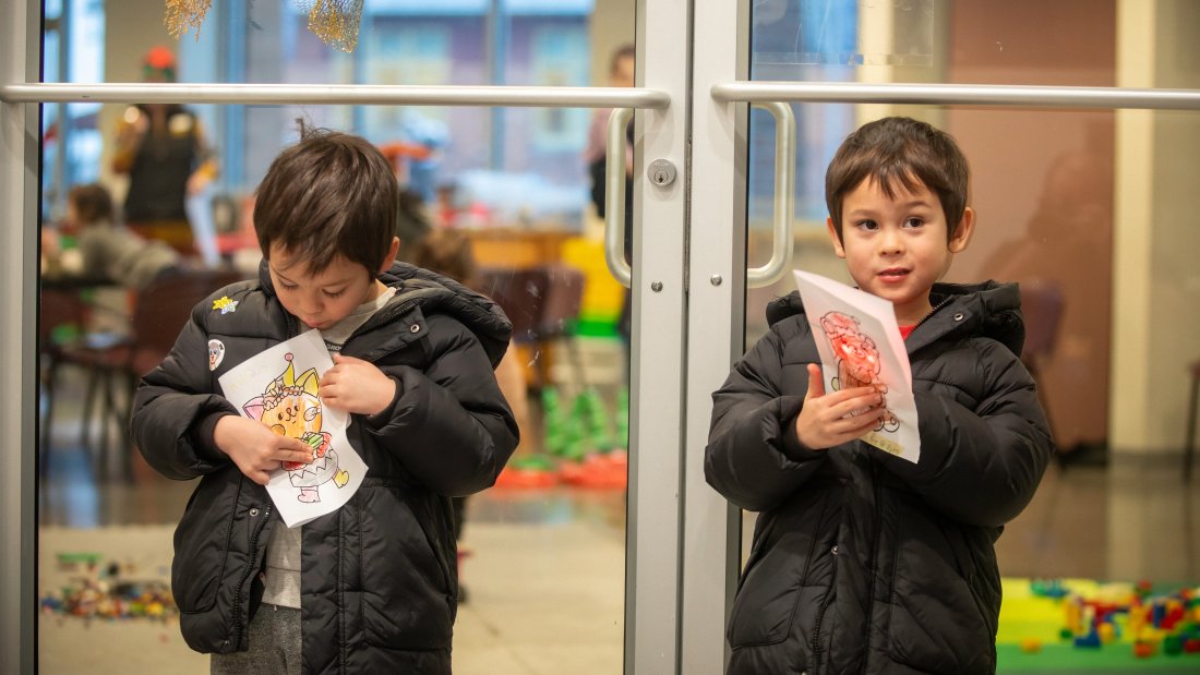 kids showing their crafts