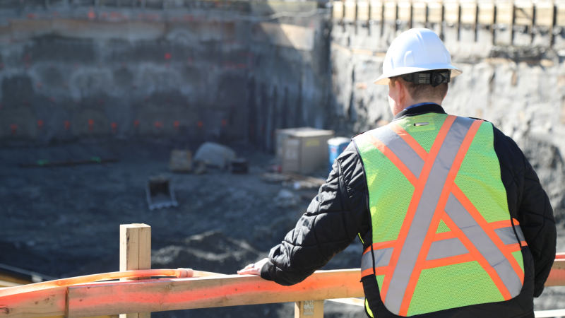 person in excavation pit