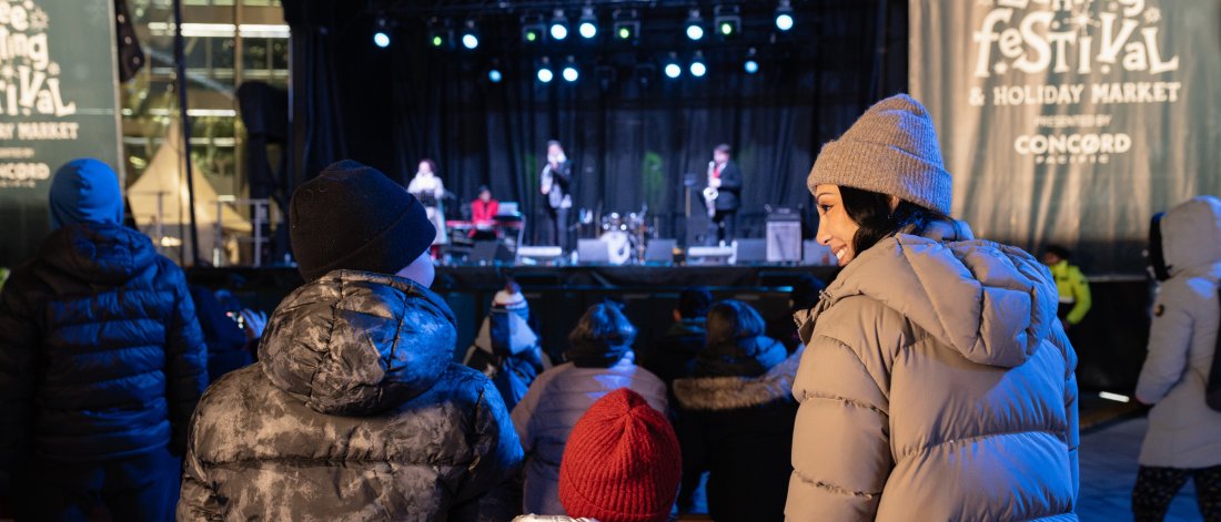 family looking at stage