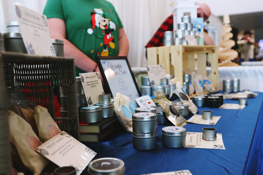 a vendor at a holiday market