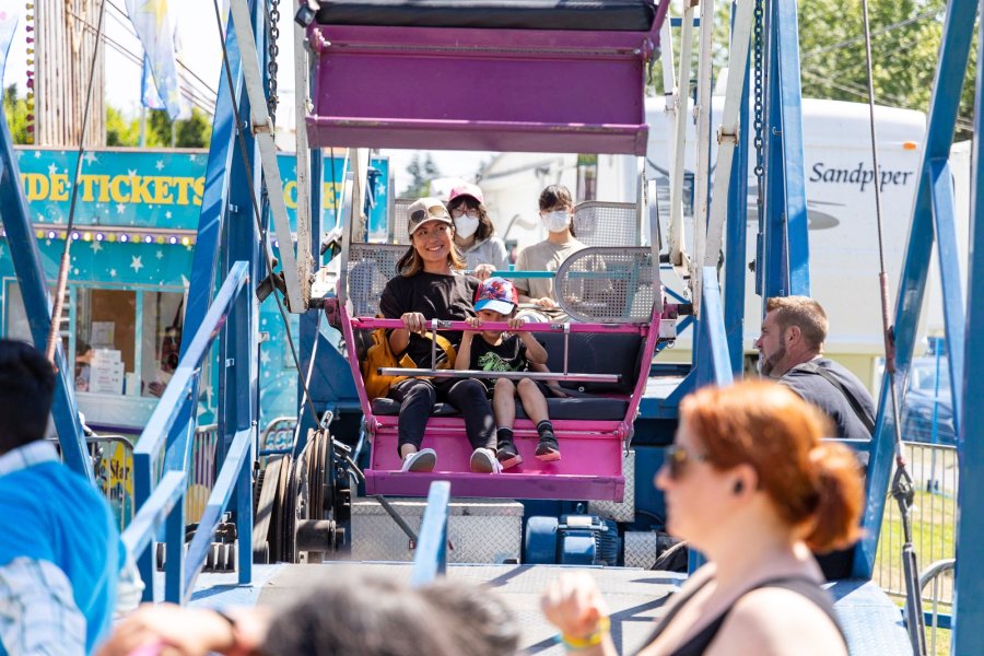 Family-friendly amusement rides and inflatables at fusion festival