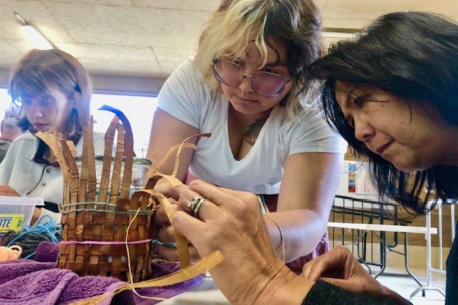 Artist Joan Williams teaching cedar weaving